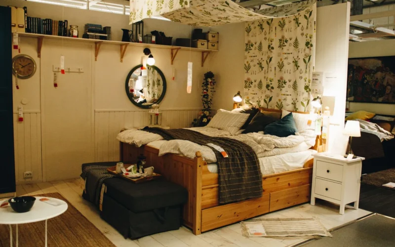 Queen platform bed with four pull-out wheeled storage drawers in natural oak finish