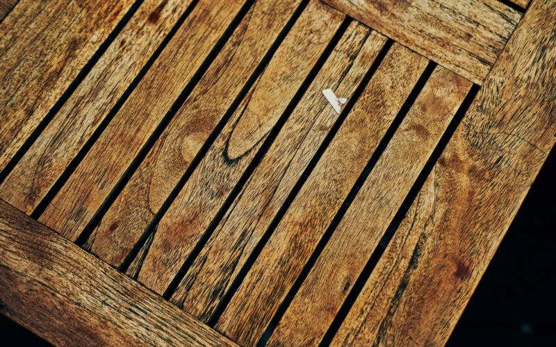 Felt-backed custom table pad fitted over a solid oak dining table surface